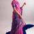 Checkered polyester viscose chanderi saree featuring vibrant printed motifs & traditional zari border