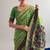 Checkered polyester viscose chanderi saree featuring vibrant printed motifs & traditional zari border