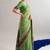 Checkered polyester viscose chanderi saree featuring vibrant printed motifs & traditional zari border