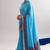 Checkered polyester viscose chanderi saree featuring vibrant printed motifs & traditional zari border