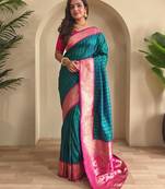Teal art silk  woven saree