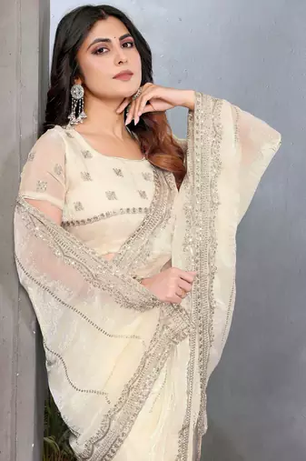 Cream fendy chiffon sequence work saree with matching blouse piece