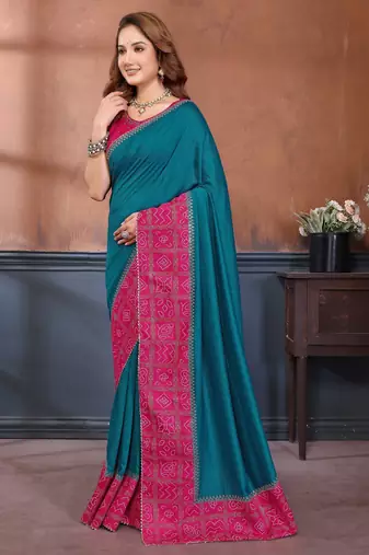 Teal vichitra silk bandhani patta stone work saree with contrast blouse piece