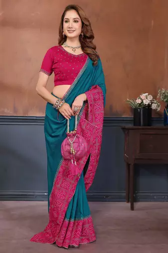 Teal vichitra silk bandhani patta stone work saree with contrast blouse piece