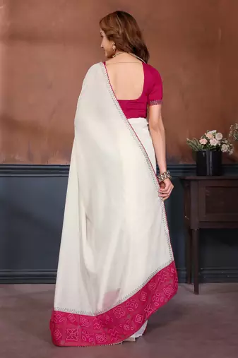 White vichitra silk bandhani patta stone work saree with contrast blouse piece