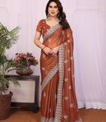 Rust orange georgette embroidery coding work saree with matching blouse piece