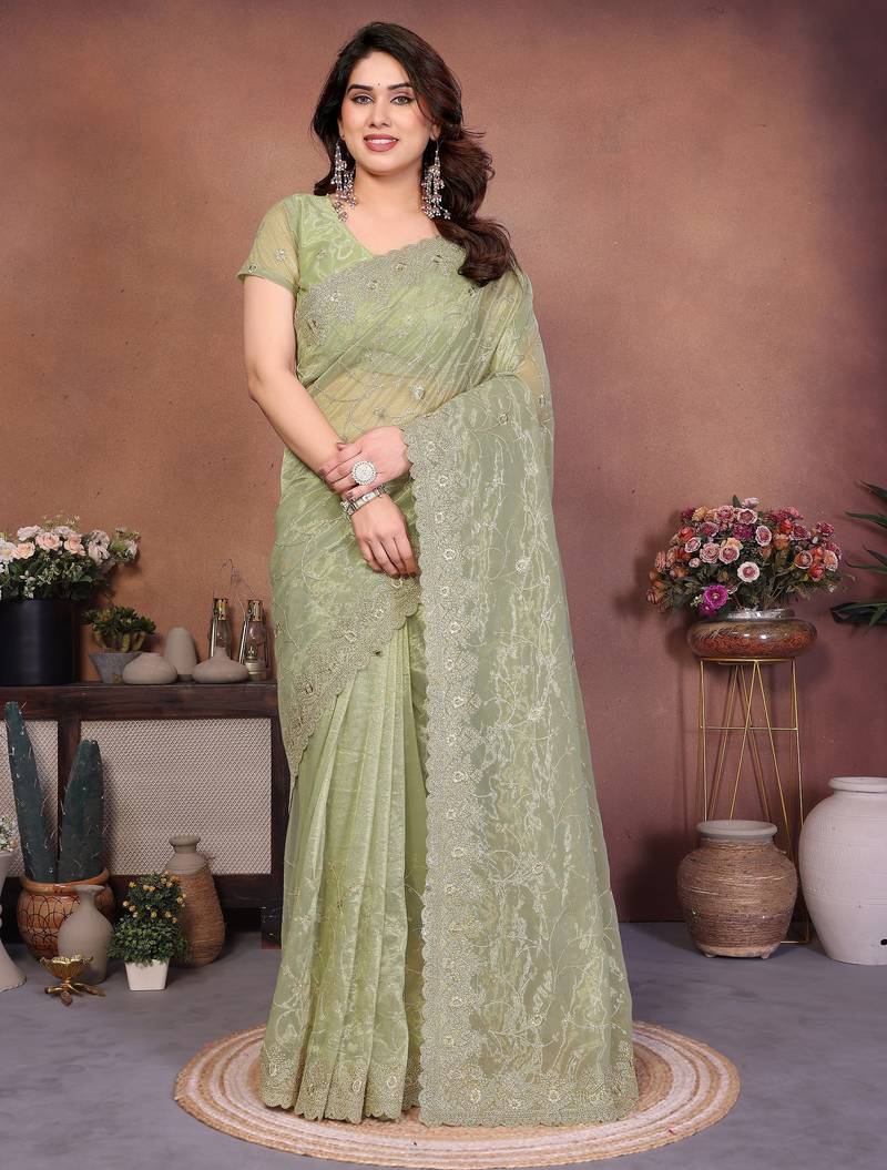 Green twill net embroidery work saree with matching blouse piece