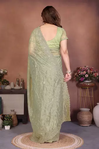 Green twill net embroidery work saree with matching blouse piece