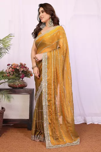Gold chiffon sequence work saree with matching blouse piece