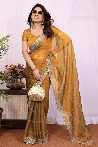 Gold chiffon sequence work saree with matching blouse piece