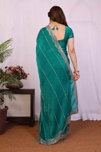Teal chiffon sequence work saree with matching blouse piece
