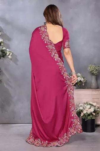 Pink soft satin saree with embroidered border and matching blouse piece
