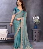 Sky blue fandy satin saree with embroidered lace border and matching blouse piece
