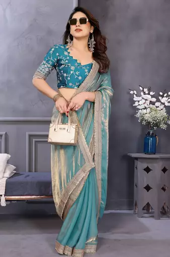 Sky blue fandy satin saree with embroidered lace border and matching blouse piece