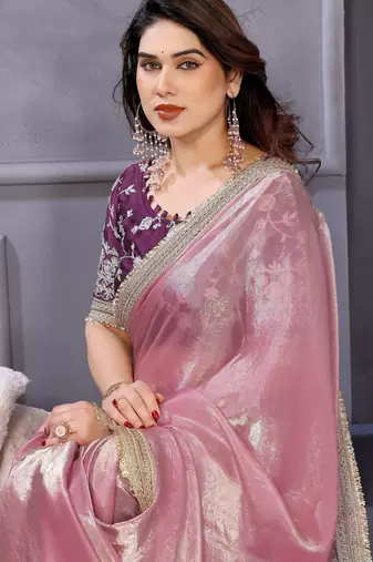 Pink fandy satin saree with embroidered lace border and matching blouse piece