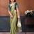 Light green fandy satin saree with embroidered lace border and matching blouse piece
