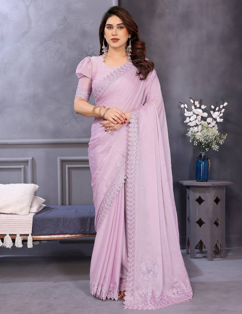 Pink rangoli silk saree with sequence embroidery lace border and matching blouse piece
