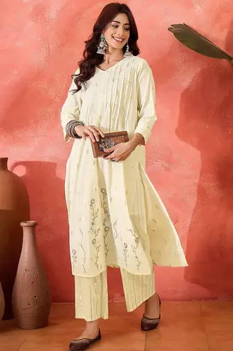 Women floral embroidered cotton kurta with trousers