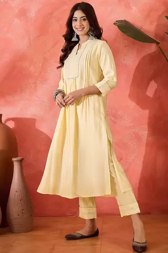 Women solid kurta with trousers