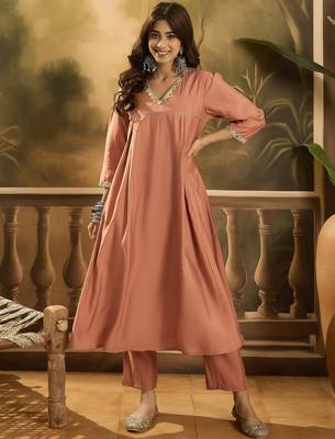 Women solid embroidered kurta with trousers 1