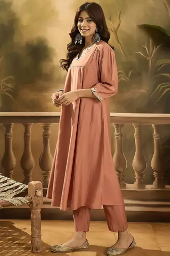 Women solid embroidered kurta with trousers