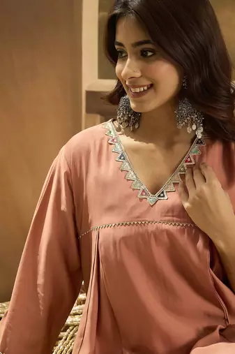Women solid embroidered kurta with trousers