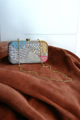 Multicolour sequinned party clutch