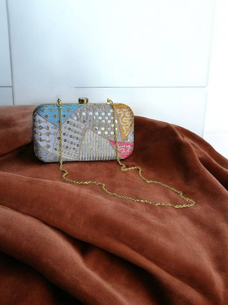 Multicolour sequinned party clutch