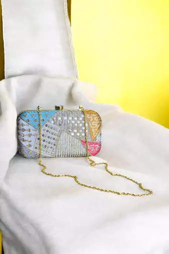 Multicolour sequinned party clutch