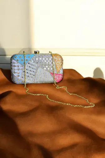 Multicolour sequinned party clutch
