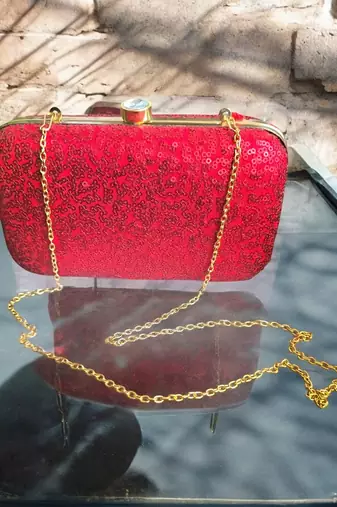 Red sequinned party clutch