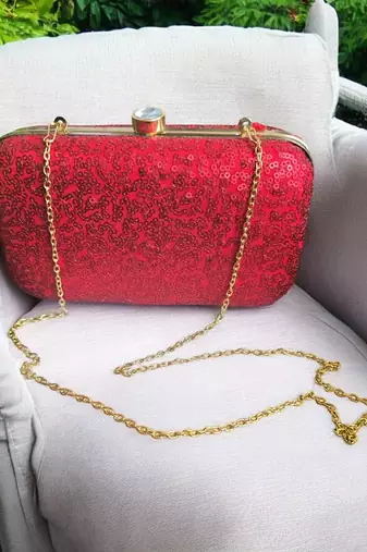Red sequinned party clutch