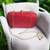 Red sequinned party clutch