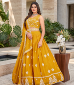 yellow sequins and thread embroidered georgette lehenga Choli