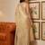 Cream woven tissue silk saree with blouse