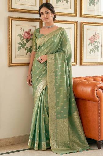 Green woven tissue silk saree with blouse