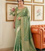 Green woven tissue silk saree with blouse
