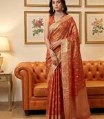 Orange woven tissue silk saree with blouse