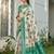 Green silk blend woven saree with blouse