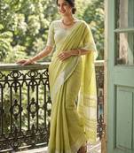 Green linen zari work saree with blouse
