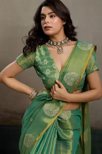 Green tissue silk woven saree with blouse