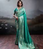 Turqoise silk blend woven saree with blouse