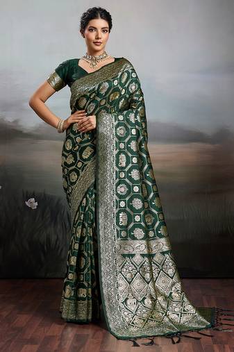 green silk blend woven saree with blouse