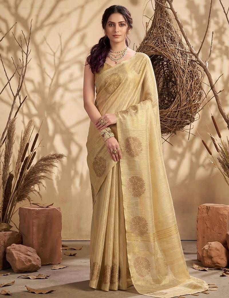 Cream tissue silk woven saree with blouse