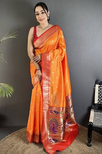 Women orange peacock motifs lichi silk saree