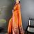 Women orange peacock motifs lichi silk saree