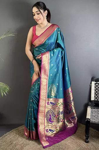 Women teal peacock motifs lichi silk saree