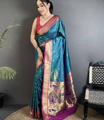 Women teal peacock motifs lichi silk blend saree