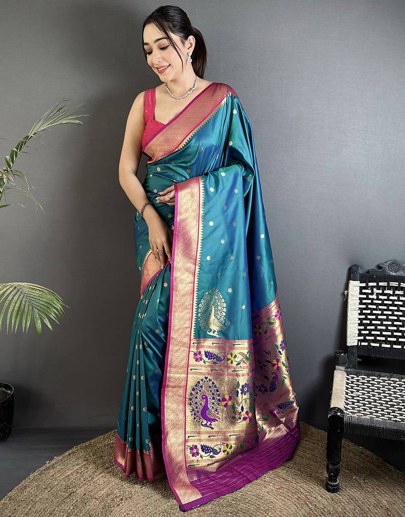 Women teal peacock motifs lichi silk saree