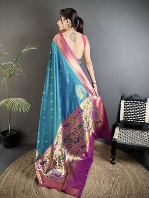 Women teal peacock motifs lichi silk blend saree 3